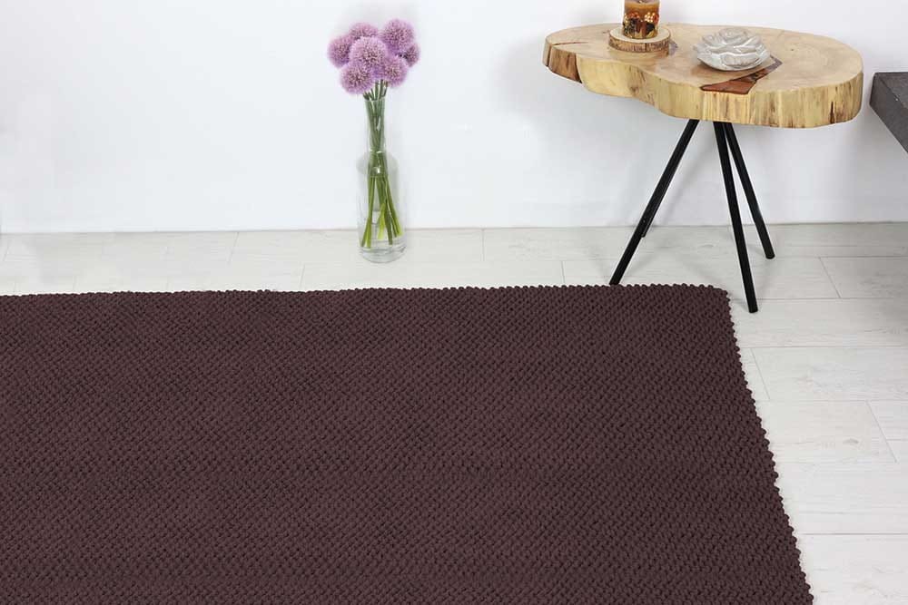 Bawełniany dywan do sypialni lub salonu, kolor jasny brąz.