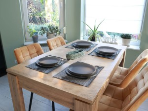 Oliwkowy, bawełniany koszyk na sztućce.