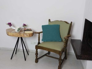 Szmaragdowa, bawełniana poduszka dekoracyjna.